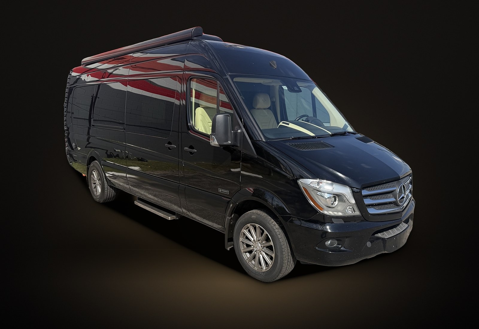 Black Mercedes-Benz Sprinter, front three-quarter view