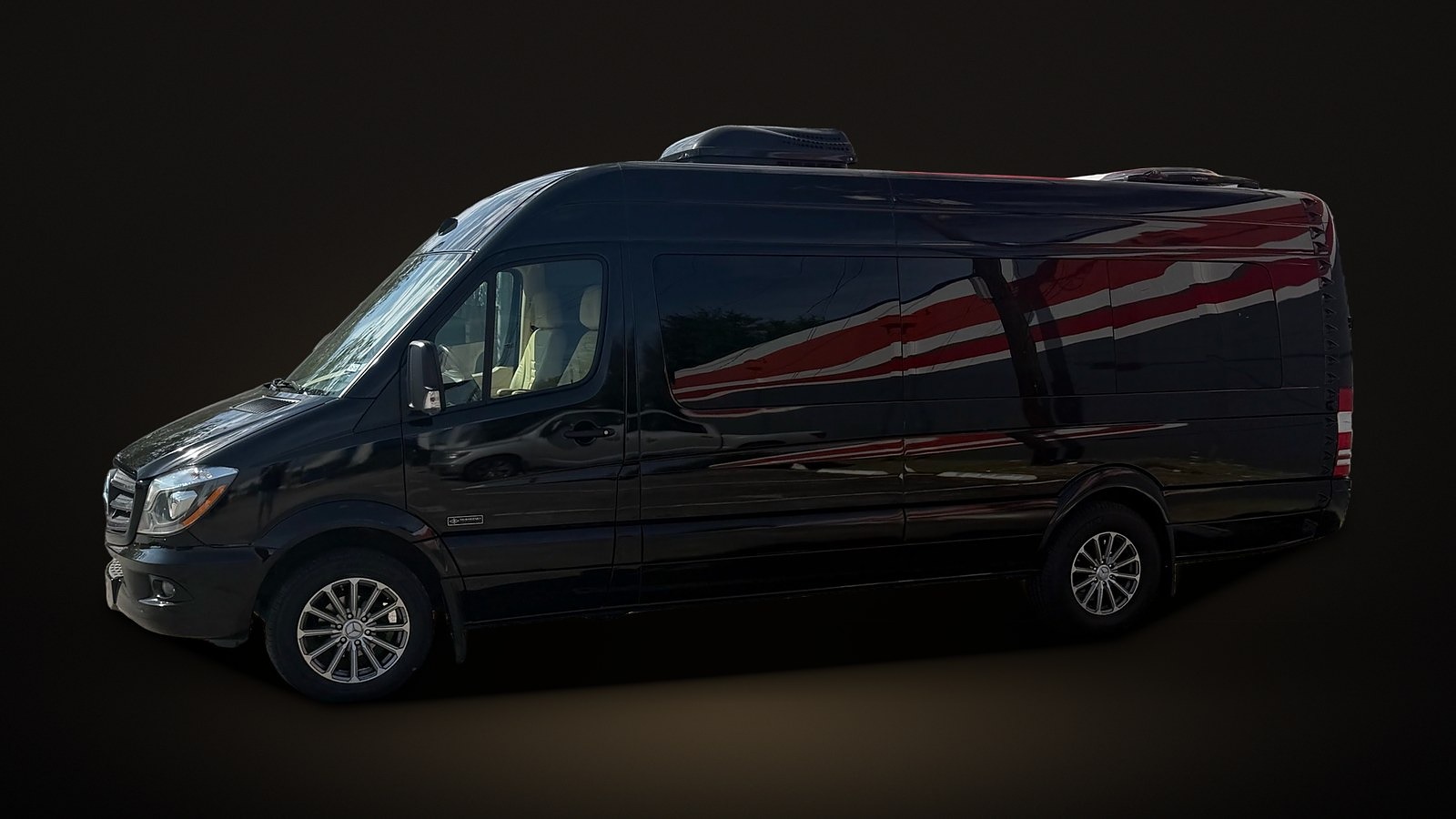 Black Mercedes-Benz Sprinter, side view